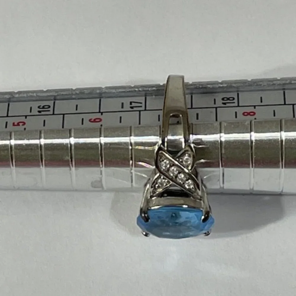 Blue topaz and silver ring.